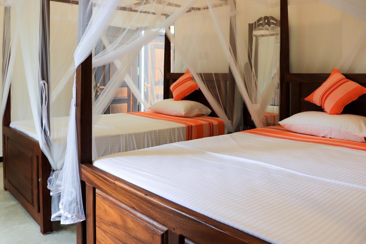 Welcome Inn Мириса Екстериор снимка