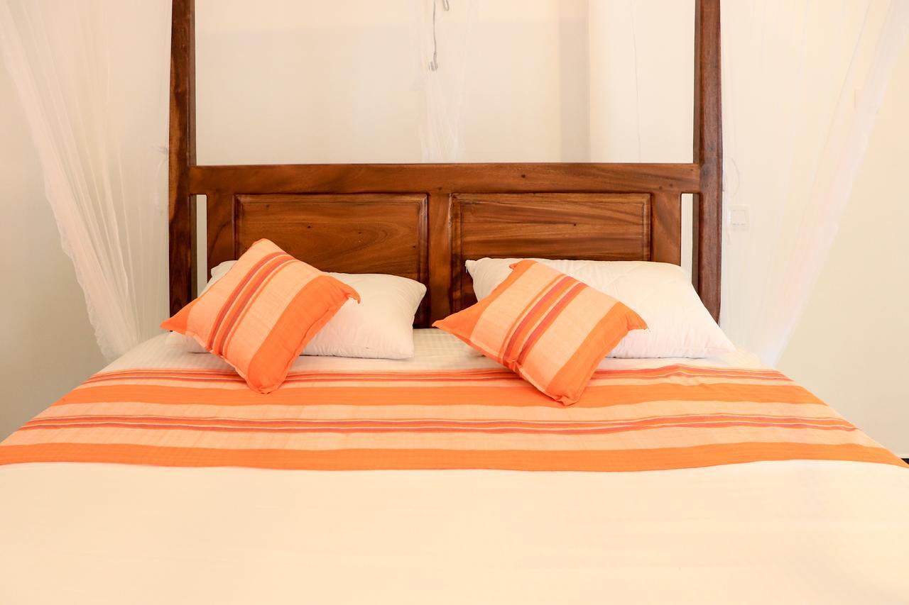 Welcome Inn Мириса Екстериор снимка